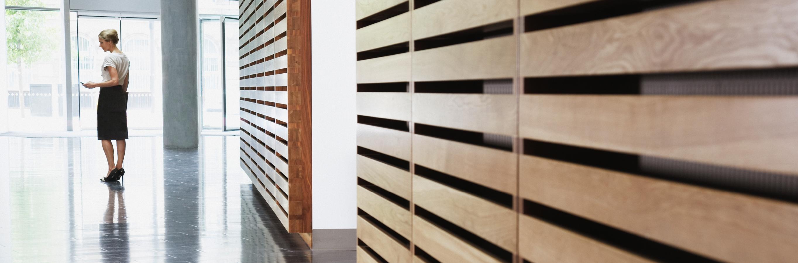 Financial professional woman in an office lobby